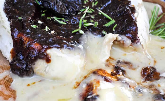 Cheese on a cedar grilling plank