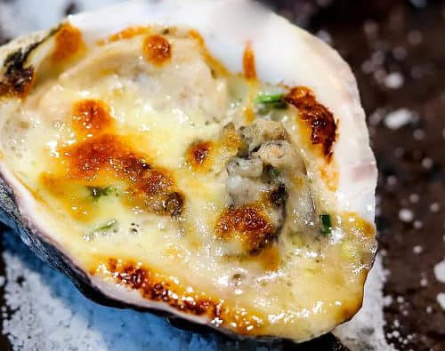 Oysters on a cedar grilling plank
