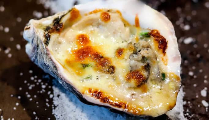 Oysters on a cedar grilling plank