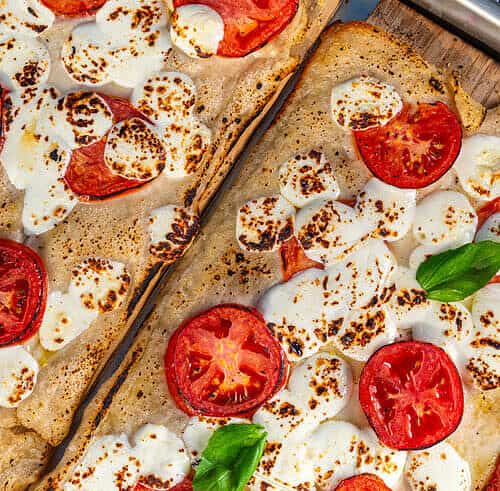 Pizza on a cedar grilling plank