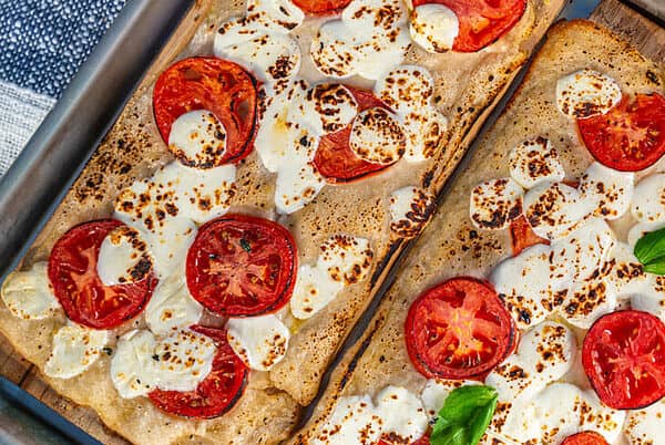 Pizza on a cedar grilling plank