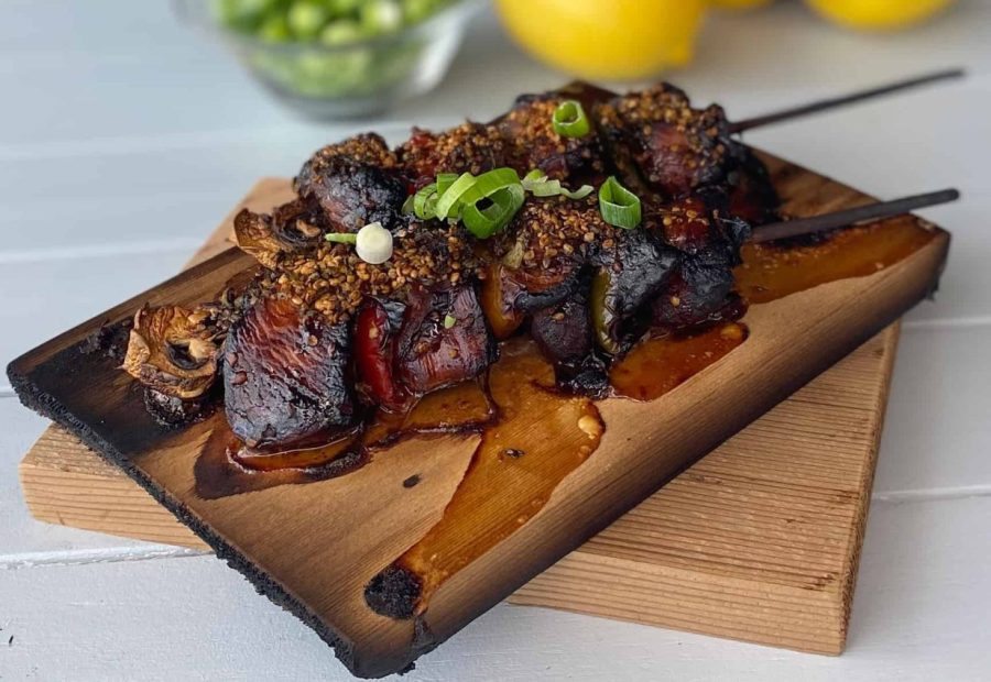 kebabs with spices on grilling plank