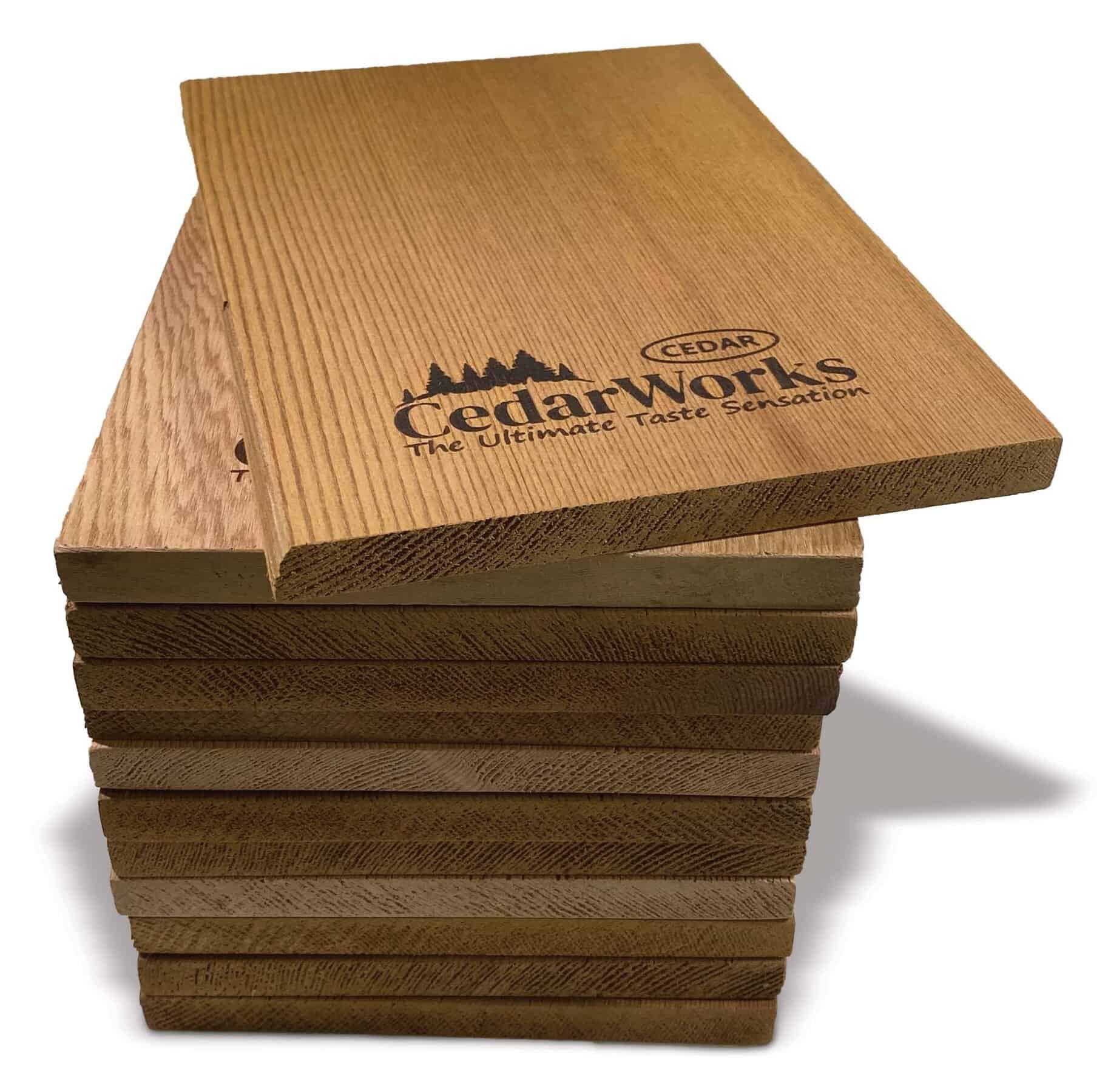 Smooth cedar wood sample slats showcasing natural grain and finish, branded with Cedar Works logo, emphasizing premium quality cedar products for furniture and craftsmanship.