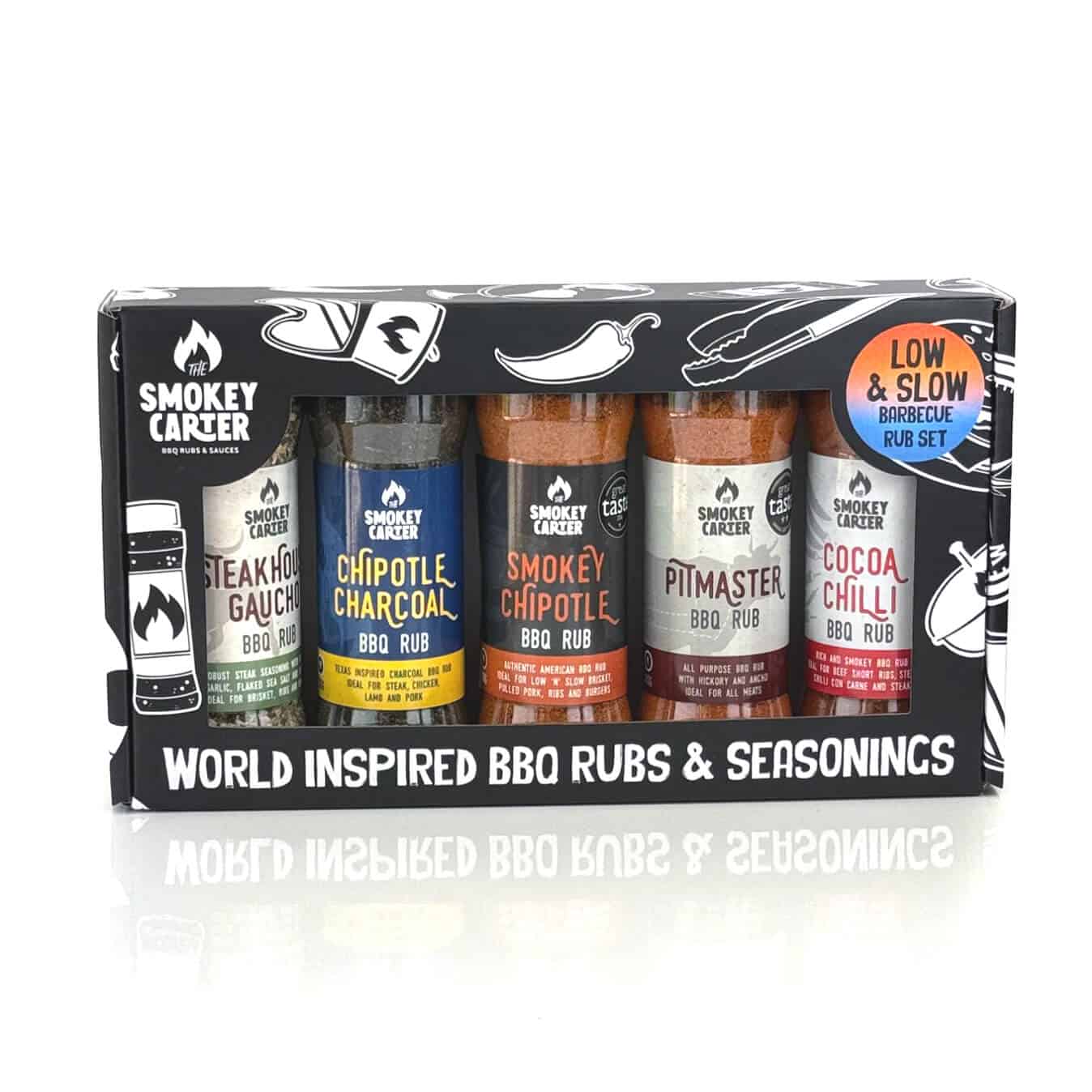 Smokey Carter BBQ rub set featuring world-inspired barbecue seasonings and sauces, includes flavors like Chipotle Charcoal, Smokey Chipotle, Pitmaster, and Cocoa Chilli for grilling enthusiasts.